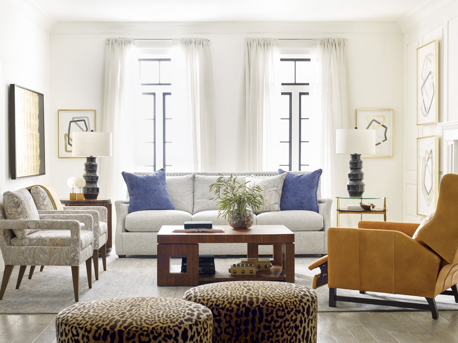 Marcoux Long Sofa, Wyatt Leather Power Recliner, Vallone Chair, Sully Swivel Ottoman.